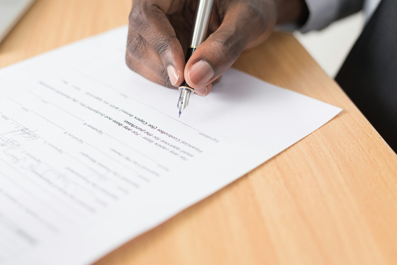 Reviewing paperwork at a desk
